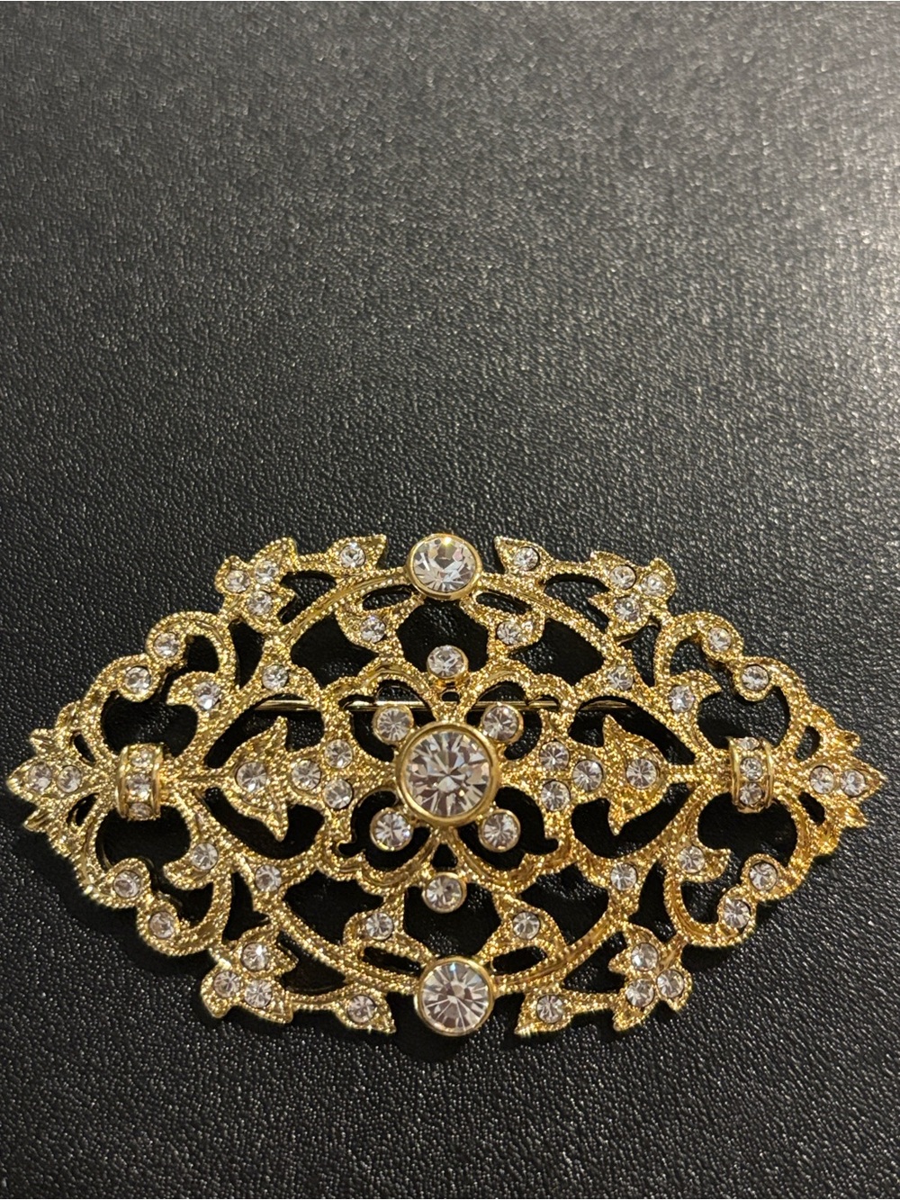 VTG JBK gold tone rhinestone brooch signed